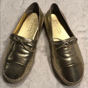 Prada. Metallic gold